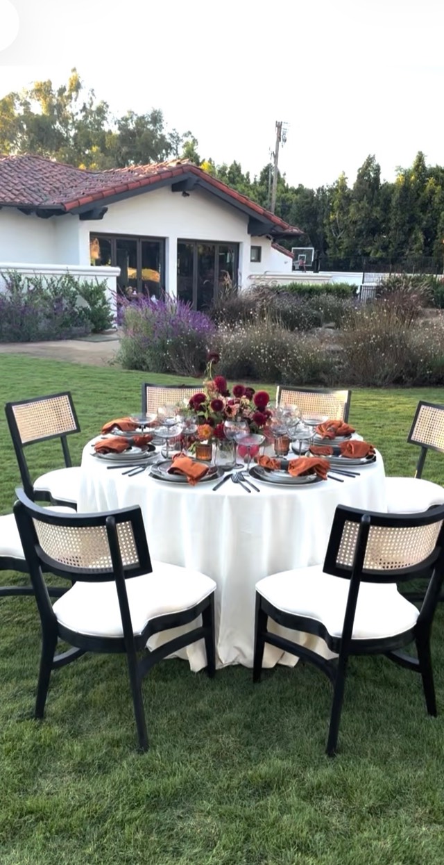 Autumn Romance wedding — bride in flowing gown amid rich autumn floral arrangements and soft candlelight, image 8 of 9 — Lux Events by Michelle