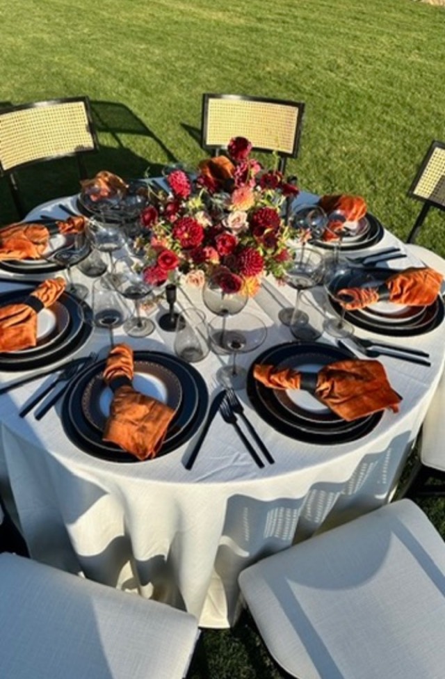 Autumn Romance wedding reception — elegant harvest table with crimson dahlia centerpieces and golden ambient light, image 9 of 9 — Lux Events by Michelle