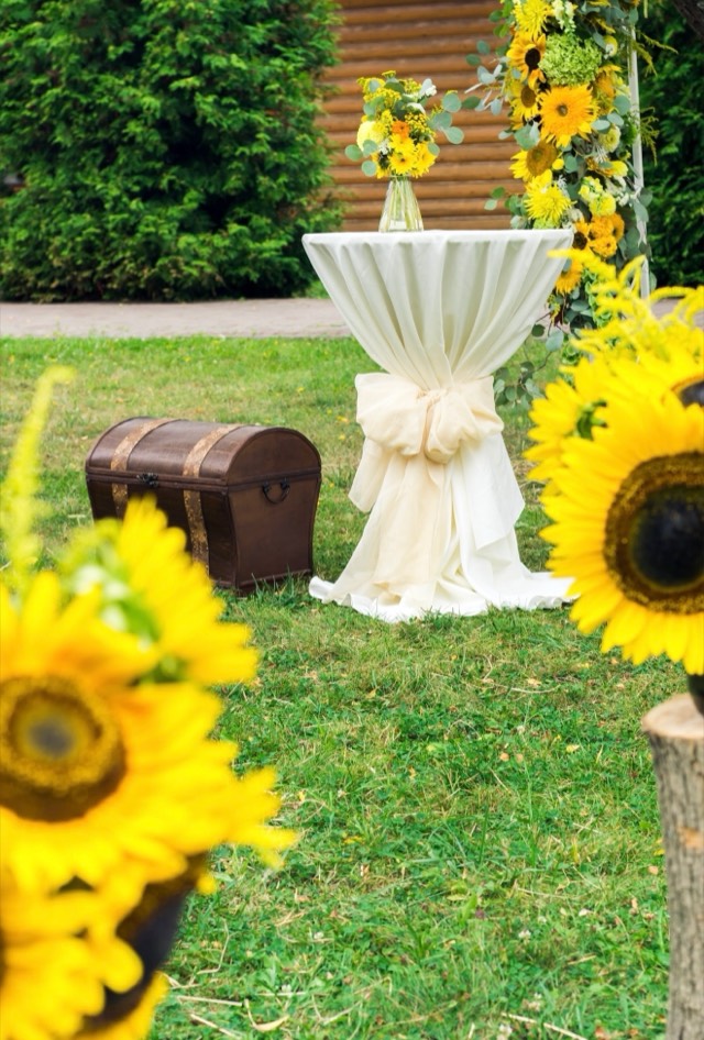 Destination wedding ceremony — romantic outdoor setup at a resort estate with floral arch, image 10 of 10 — Lux Events by Michelle