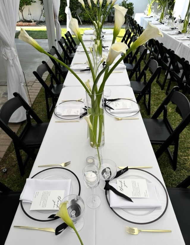 Minimalist luxury event design — tablescape with white linens, tapered candles, and restrained floral accent, image 11 of 14 — Lux Events by Michelle
